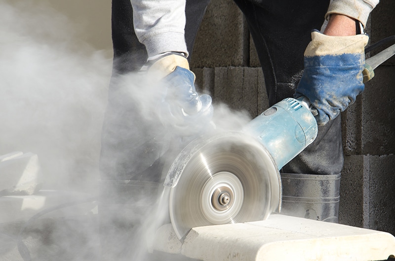 Asbestos surveys for construction - photo of grinding operation